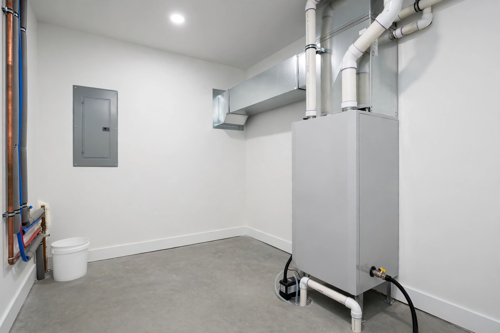 New furnace installed in a clean utility room
